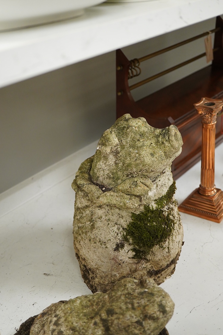 A garden composition stone model of a pig - 29cm high and a similar toad